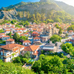 small resort village in Greece in the rays of the morning sun